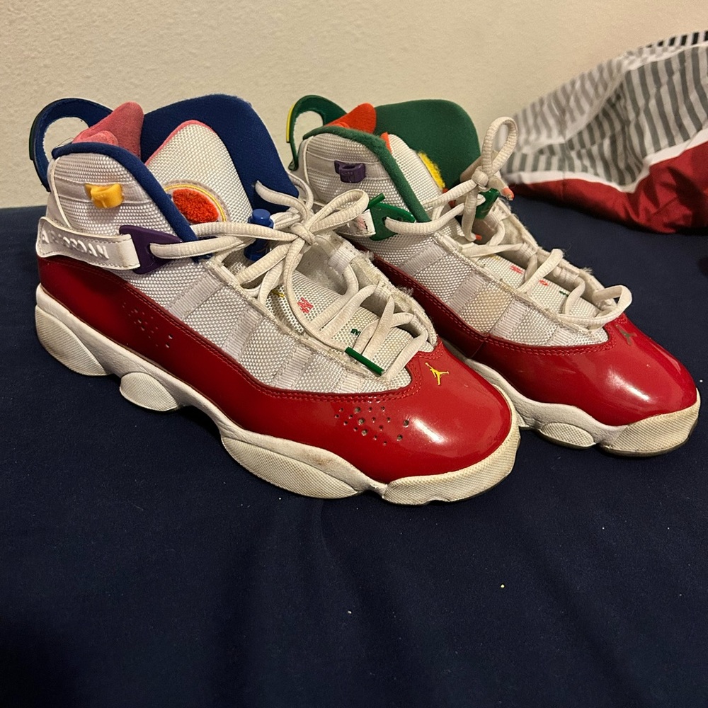 multicolored jordan’s size 7y boys